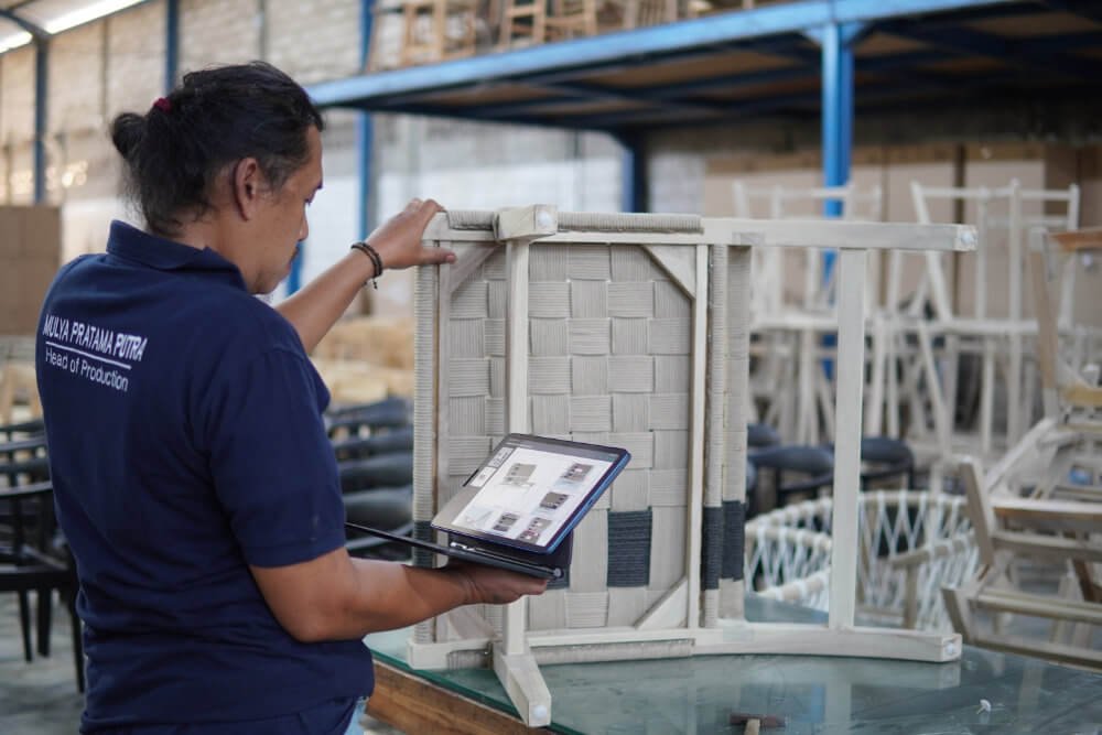 QC officer is inspecting joinery for product has Felgt timber legal wood 