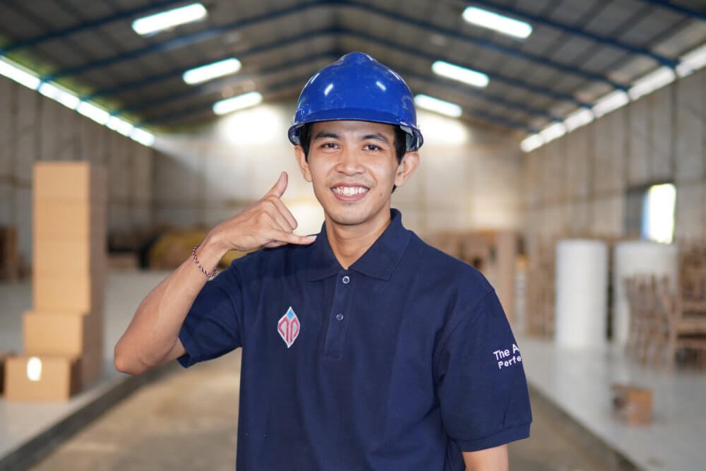 a furniture supplier worker with calling gesture