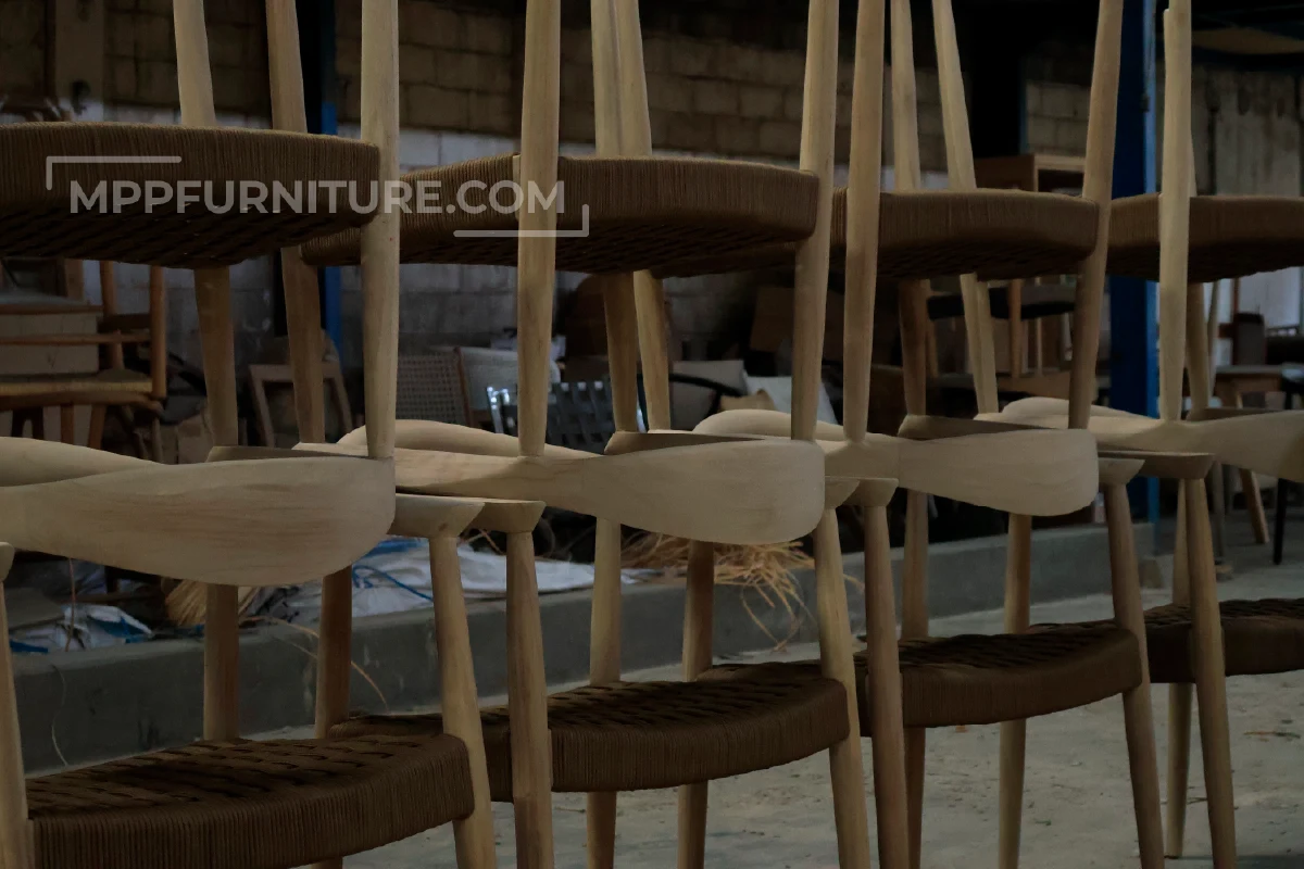 Indonesian Teak Furniture Dining Chair stacked up before final inspection at Teak Furniture Indonesia Factory, MPP Furniture