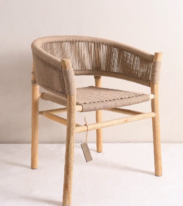 A stylish piece of indoor teak furniture, this armchair features a natural finish and a fully wrapped woven rope back and seat.