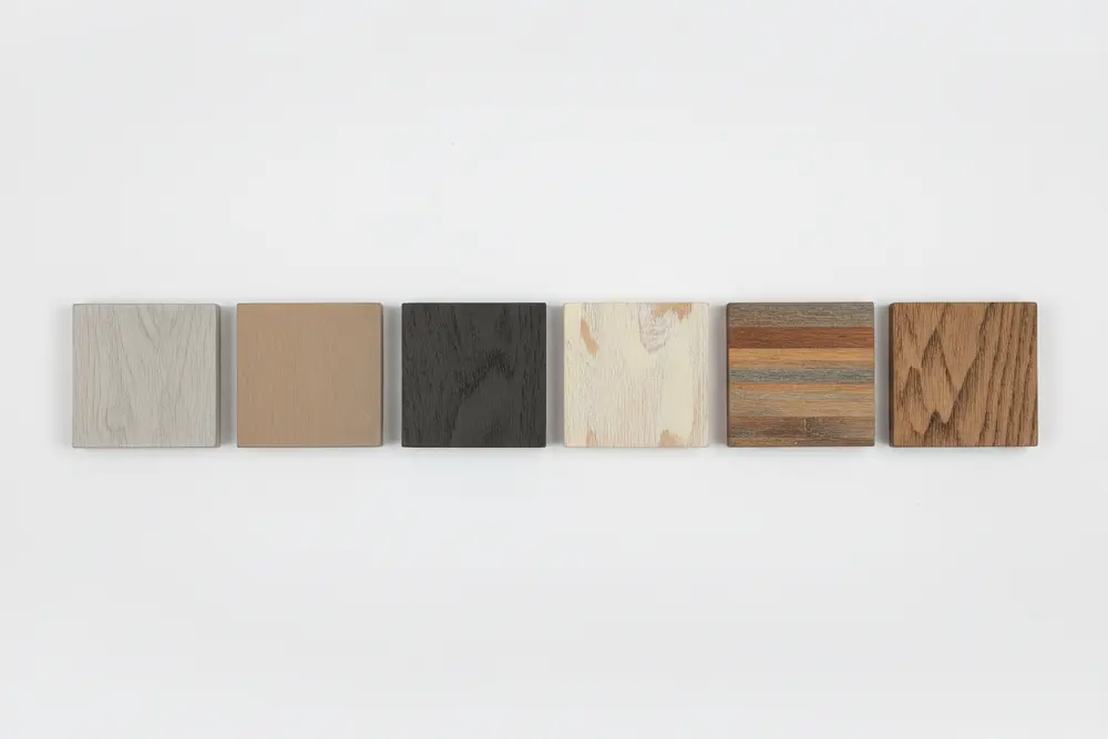 Professional sample board showcasing the consistency and variety of different Weathered Wood finishes, including taupe, coastal grey, and sun-kissed blonde tones.