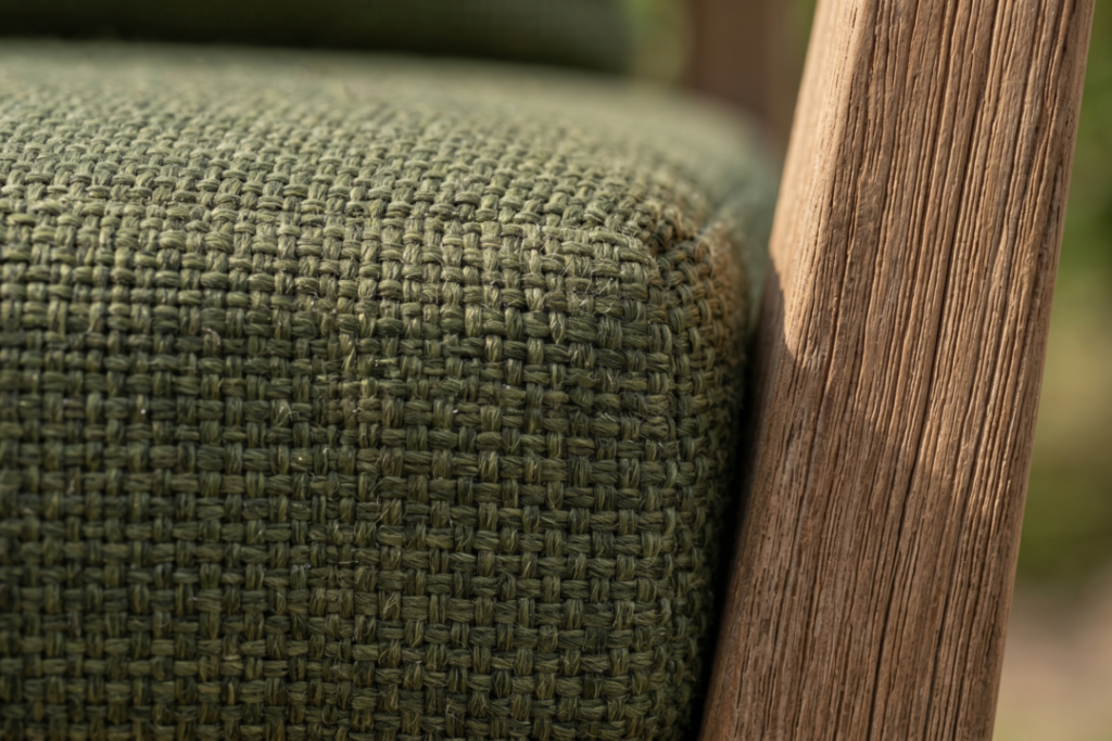 Green outdoor cushion in close shoot