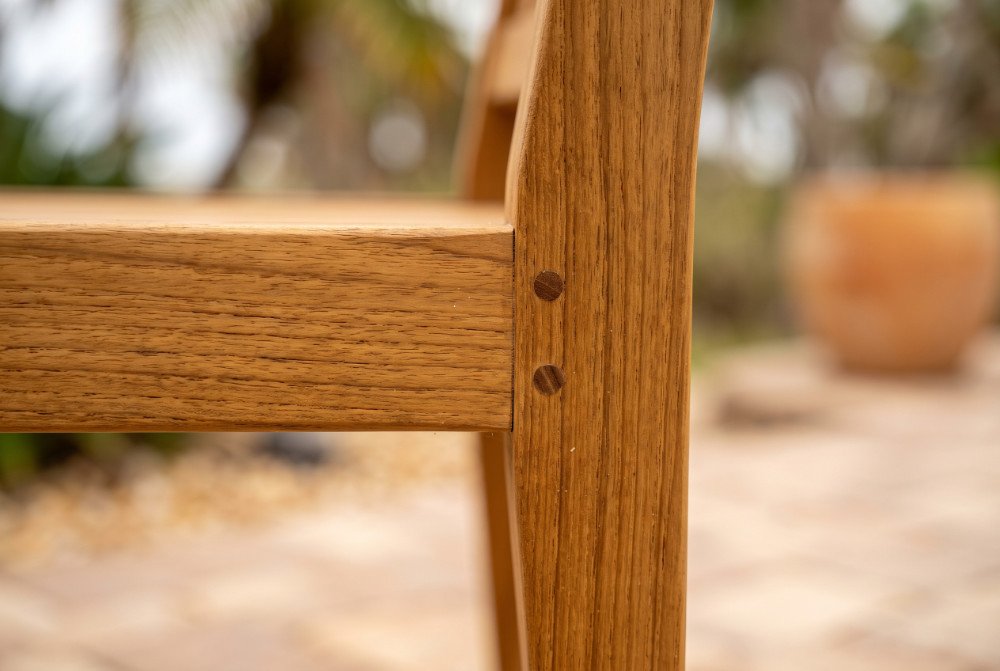 Close-up of durable teak wood joinery designed for high-humidity coastal environments